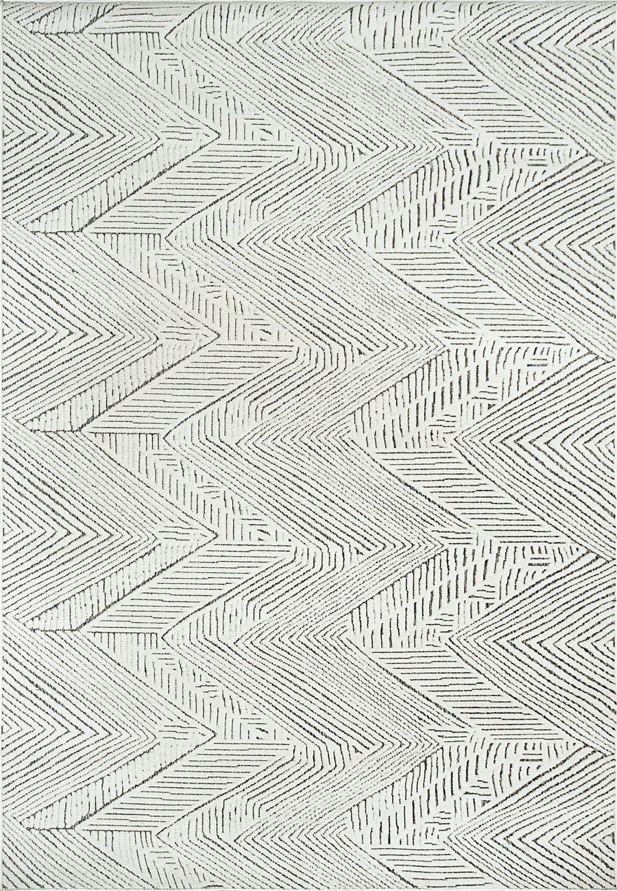 The Lotus 8142 Area Rug features a modern geometric zigzag pattern in cream and gray, with dense rows of thin lines and dashes arranged in alternating directions for a durable high-low texture and contemporary style.