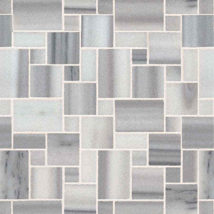 The Magic Pattern Mosaic Natural Stone features rectangular and square marble tiles in white and gray, arranged in a staggered geometric pattern with thin white grout—ideal as a stylish kitchen or bathroom backsplash.