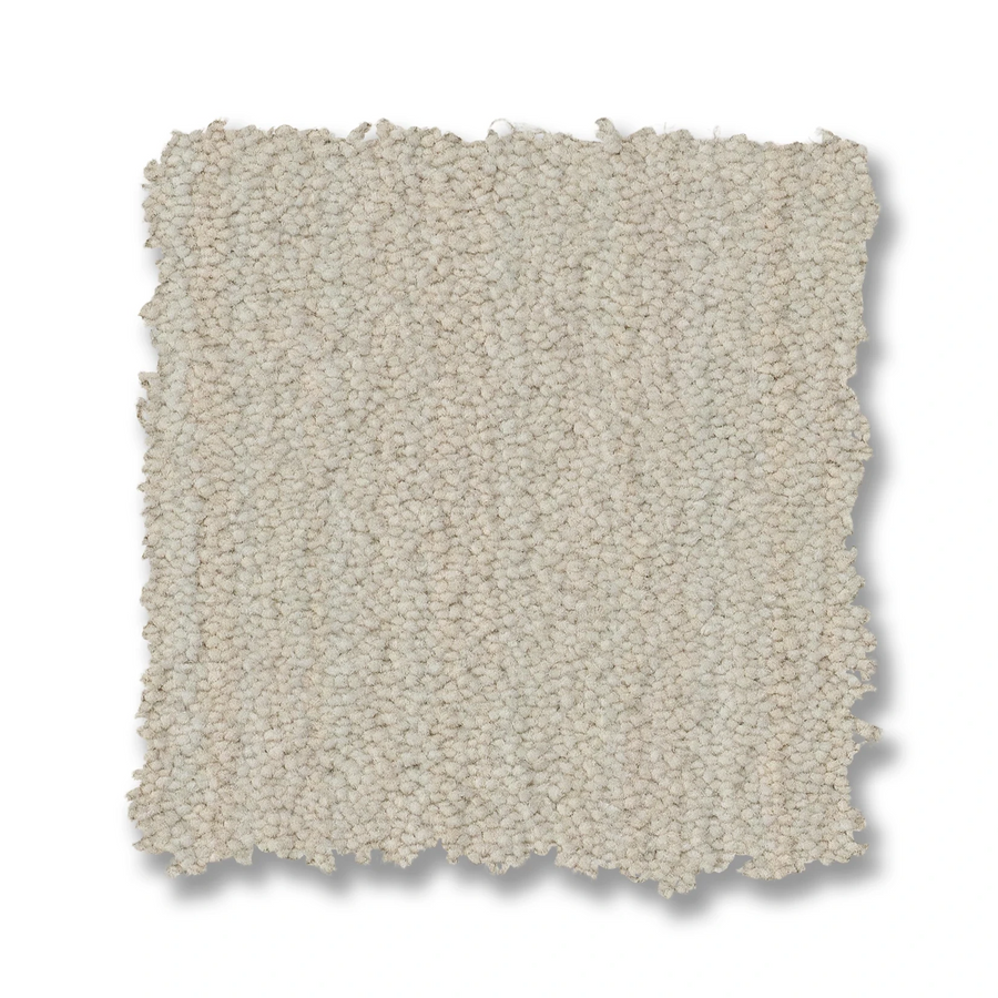 A square swatch of Magnifique On Trend Carpet in light beige features a looped pile with textured, slightly frayed edges, highlighting its timeless beauty and inviting texture against a white background.