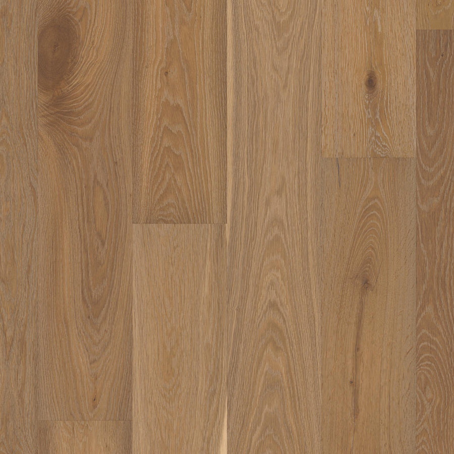 Close-up of Manchester 7 1/2" White Oak Hardwood showcasing light brown planks with natural grain patterns and knots for a textured, rustic, and timeless appearance.