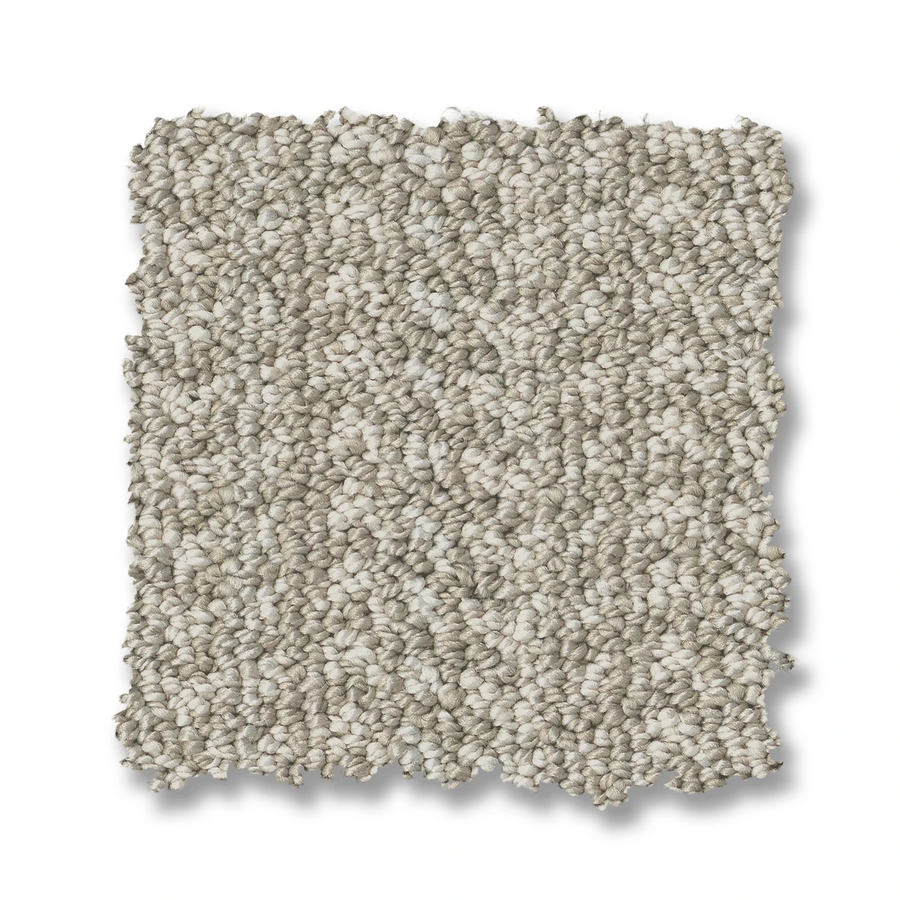 A rectangular swatch of Marquet On Trend Carpet in light beige is displayed on a white background. Its textured loop surface appears soft and dense, featuring a subtle blend of light and slightly darker fibers.