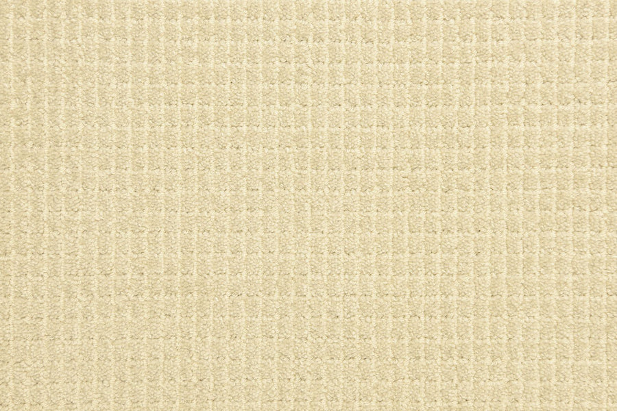 Close-up of the Bungalow Pet Friendly Carpet in beige, featuring a stylish, subtle grid-like woven texture with uniform lines and a soft look.
