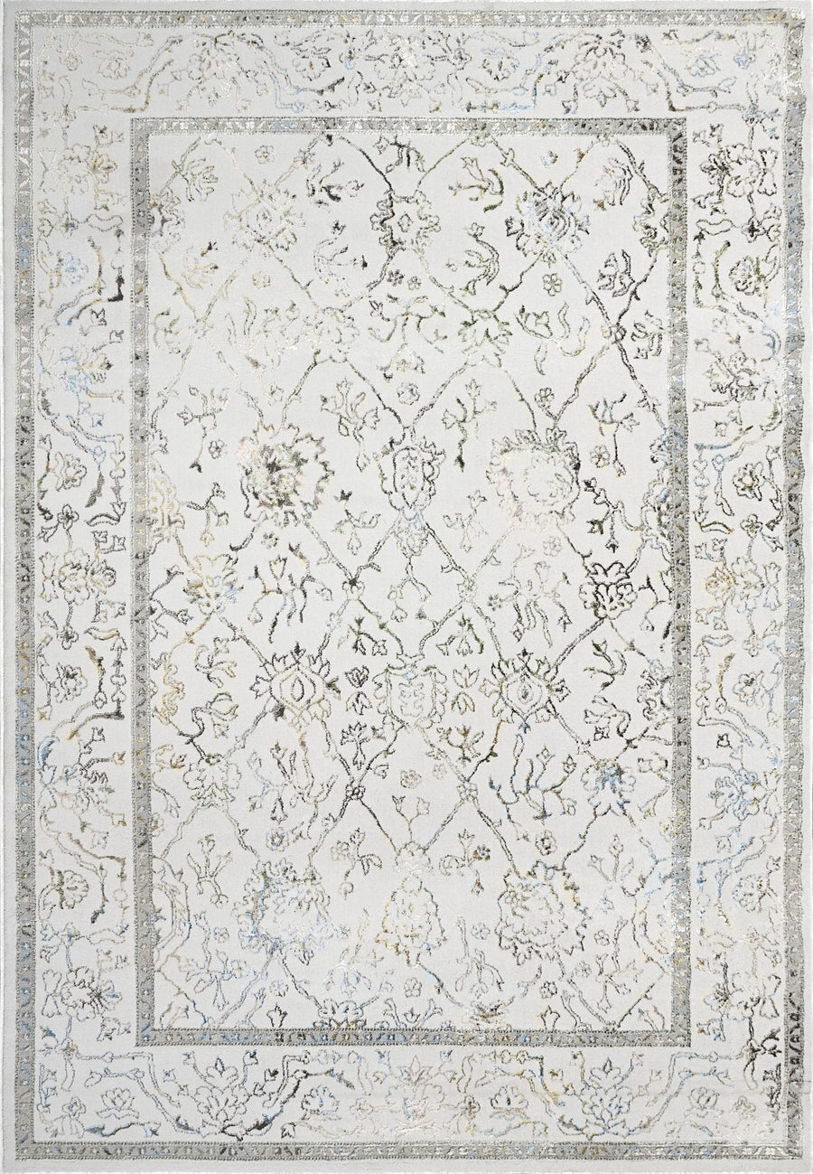 The Merit Area Rug features a light-colored, contemporary look with an intricate, faded floral and vine pattern. Subtle gray, beige, and blue accents on a white background are framed by a thin decorative border for timeless modern style.