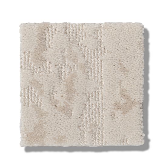 The Ming On Trend Carpet sample is square, off-white, and plush with a large-scale textured pattern. Made from luxurious yarns, it appears against a white background with a subtle shadow.