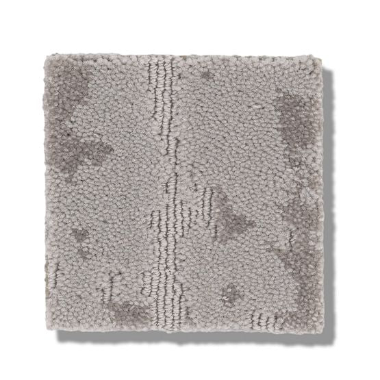 A square swatch of Ming On Trend Carpet in light gray with subtle darker gray patterns and a central vertical line design is displayed on a white background.