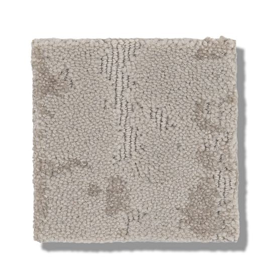 A square swatch of Ming On Trend Carpet in light beige with a soft, looped, textured pile and subtle darker details, made from luxurious yarns. The sample is shown against a white background.