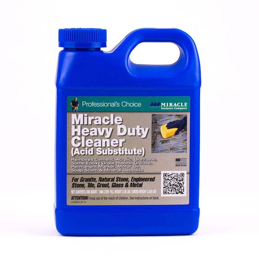 A blue plastic container labeled Heavy Duty Cleaner, an industrial cleaner and grout haze remover for granite, stone, tile, grout, glass, and metal. Includes a handle and safety warning at the bottom.