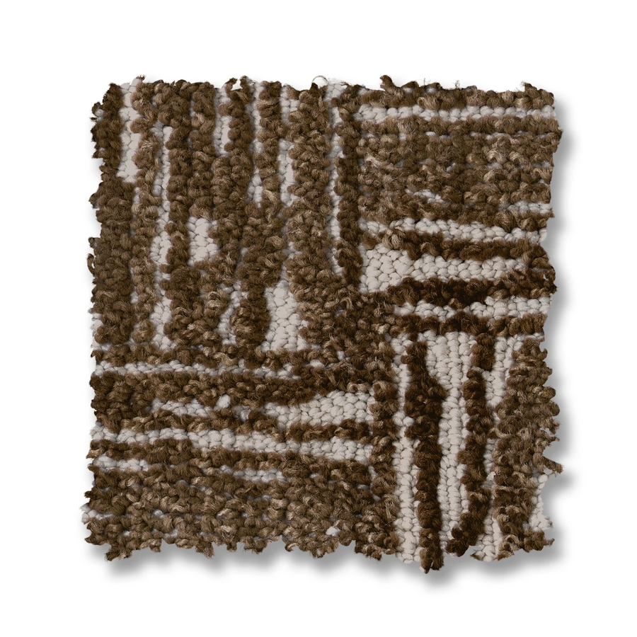 A square fabric swatch from Moderne On Trend Carpet, featuring a textured looped weave in neutral tones with an abstract geometric basket weave pattern and slightly uneven edges for a modern, organic style.