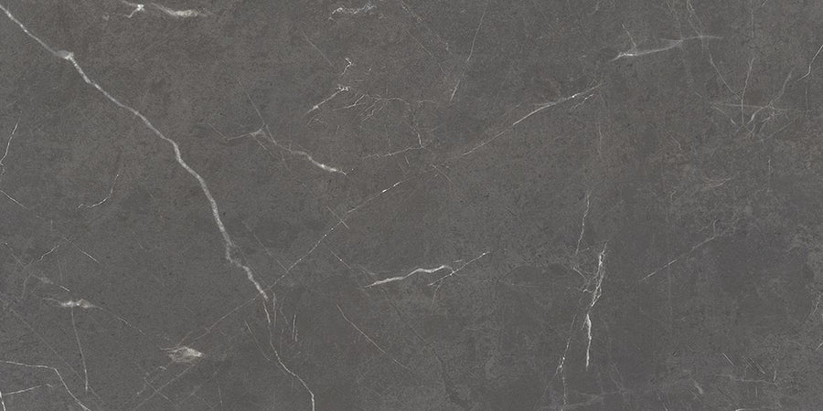 The Monaco 24x48 Porcelain Tile offers a dark gray honed marble look with fine white veins and subtle texture, creating a natural stone effect—ideal for luxurious flooring, countertops, or wall cladding.