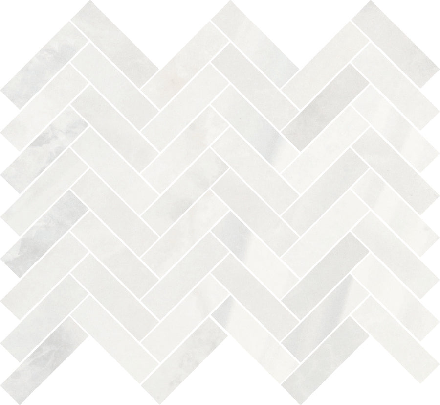 The Monte Carlo 1x3 Herringbone Mosaic Matte Porcelain Tile features a zigzag herringbone pattern with subtle gray veining, offering a sleek, modern look perfect for luxury home flooring.