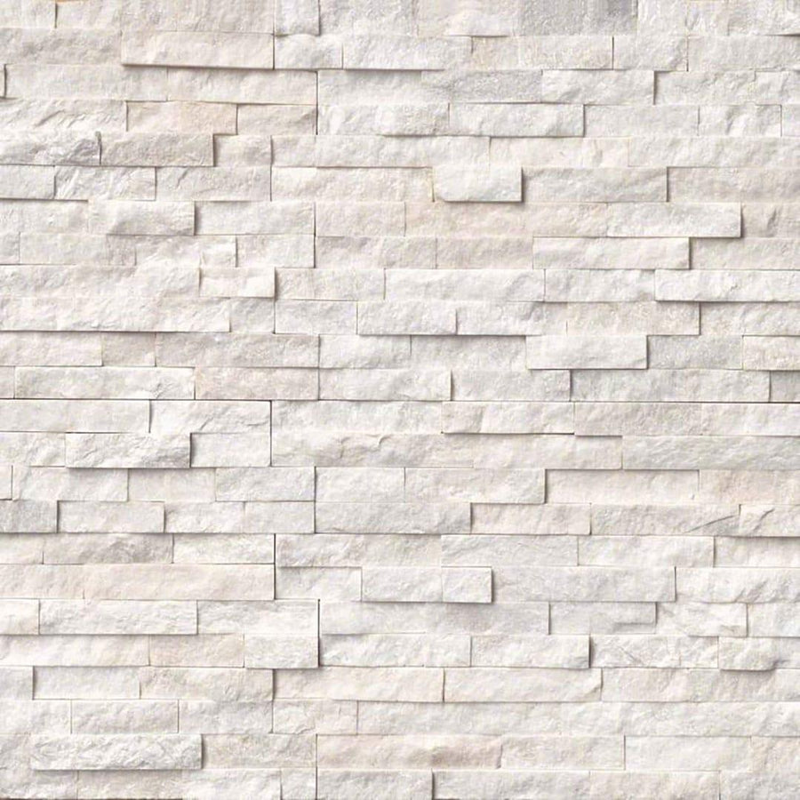 The Landscape 6x24 Natural Stone Ledger Panel features textured white split face stone in a staggered, horizontal brick pattern for a modern geometric wall design.