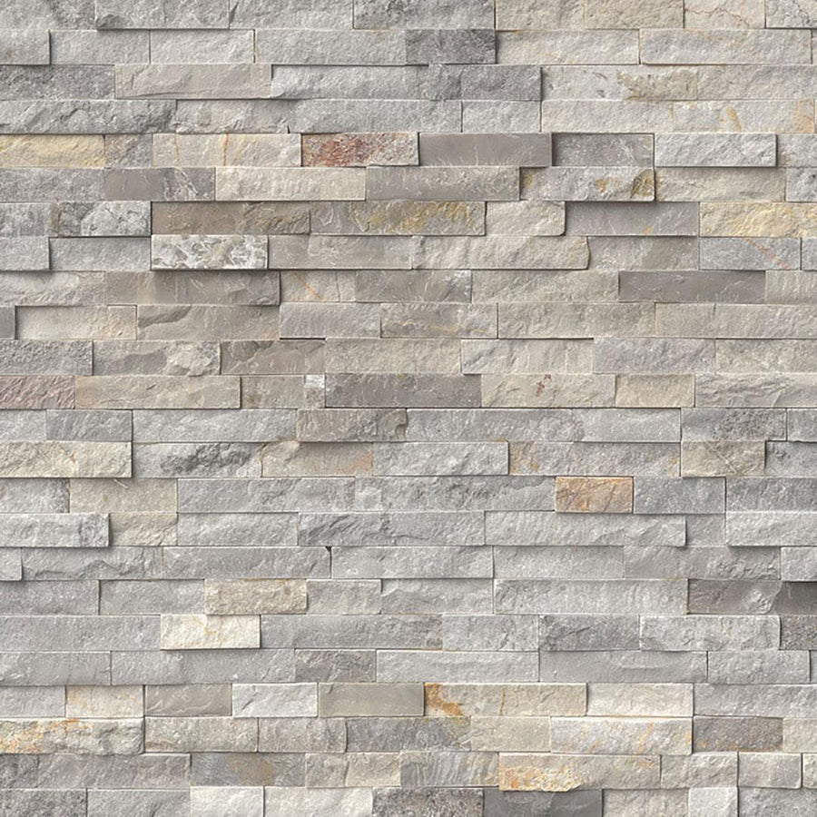 Close-up of a wall featuring Landscape 6x24 Natural Stone Ledger Panels, stacked horizontally in gray and beige tones, creating a textured and layered appearance.