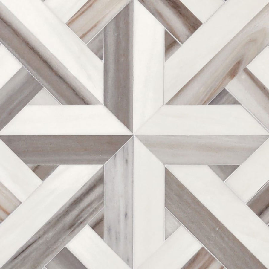 Close-up of Talya Rubicon Skyline 17x17 3/8 Waterjet Natural Stone tile featuring interlocking triangles and parallelograms in white, gray, and beige with a star-like design. Glossy finish enhances modern geometry for wall or floor use.