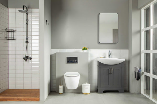 Modern bathroom with a walk-in shower, wall-mounted toilet, and the Luna 24