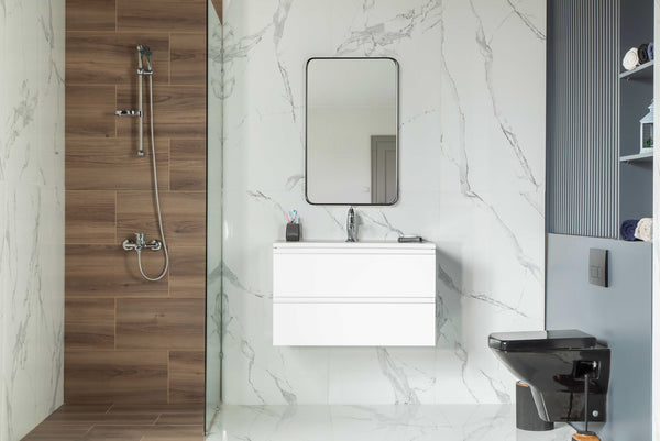 Modern bathroom with white marble walls, a Simena 30