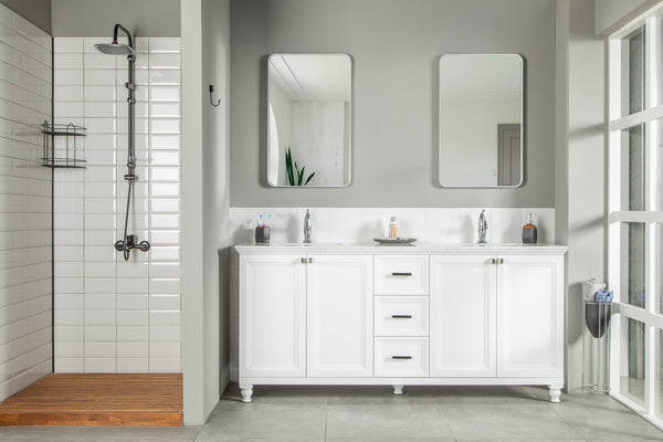 Modern bathroom with a walk-in shower featuring white subway tiles and a wooden floor, complemented by the Isabel 72
