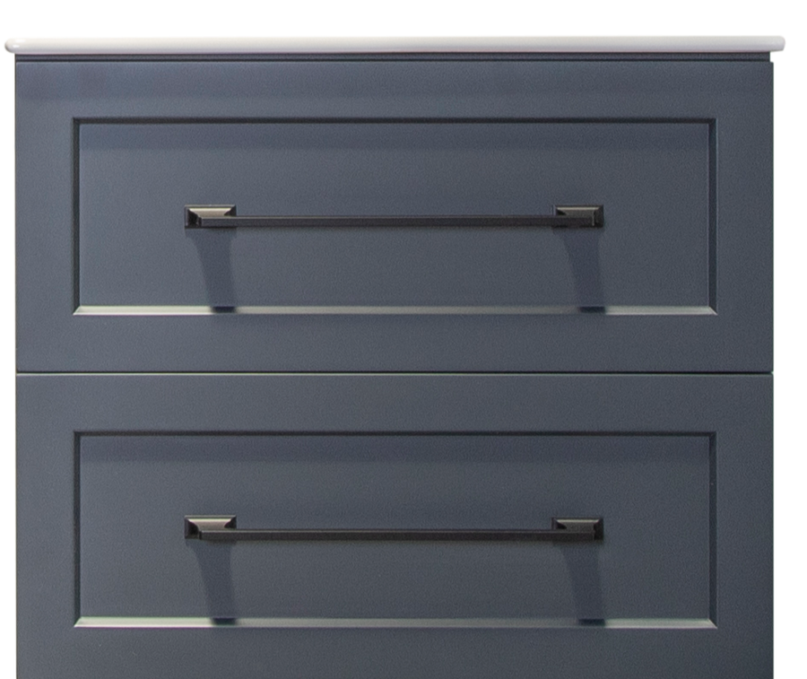 Close-up of the top portion of the Nova 24" Vanity in blue, showing two drawers with rectangular recessed panels and sleek black handles—an ideal choice for a modern bathroom makeover.