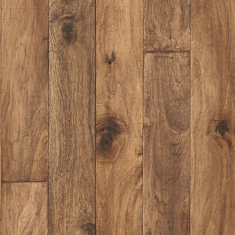 Close-up of Palisade 5" White Teak Hardwood flooring reveals natural knots, grain patterns, and rich brown tones—an ideal rustic style for a modern farmhouse aesthetic.