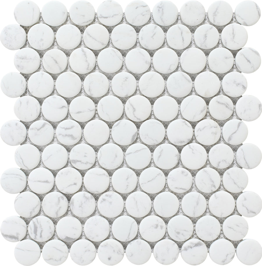 The Pantheon Penny Round Mosaic Tile features small, round, white marble tiles with subtle gray veining, arranged evenly in a grid on a mesh backing for easy installation.