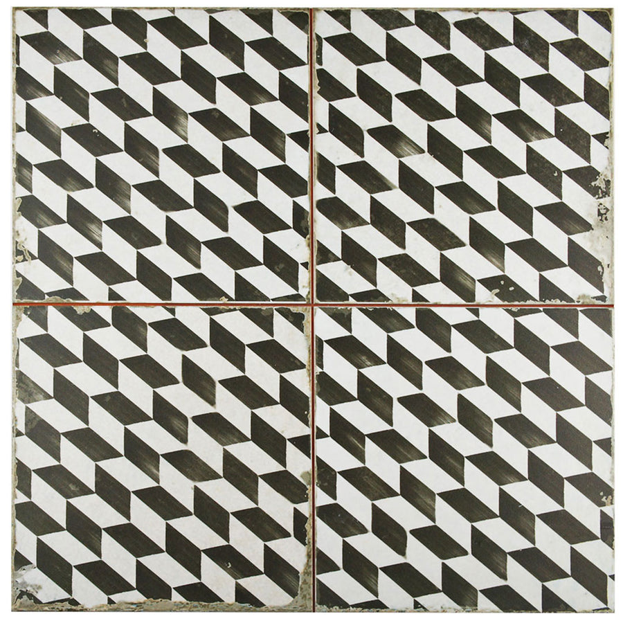 Kings Espiga 17 3/4 x17 3/4 Patterned Tile features four square ceramic floor and wall tiles with a black and white geometric cube design and slightly worn edges, bringing vintage industrial style to any space.