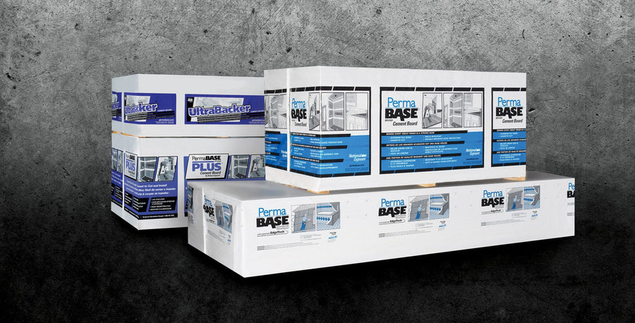 Stacks of boxed Permabase Cement Board—renowned for moisture resistance—are arranged on a dark, textured concrete background, with product labels and construction images visible on the packaging.
