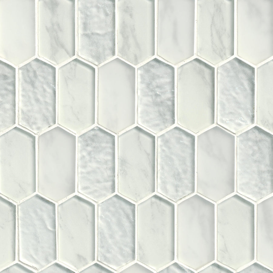 Picket Mosaic Natural Stone features marble-like white hexagonal tiles with subtle gray veining in a honeycomb pattern. The mix of smooth, polished and slightly uneven surfaces creates a look similar to glass mosaic tiles.