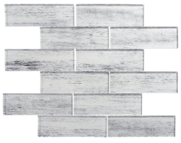The Westminster Glass Mosaic features rectangular tiles in a staggered brick pattern with a white and gray wood grain texture, creating a weathered, rustic look—ideal as a stylish backsplash against a plain white background.