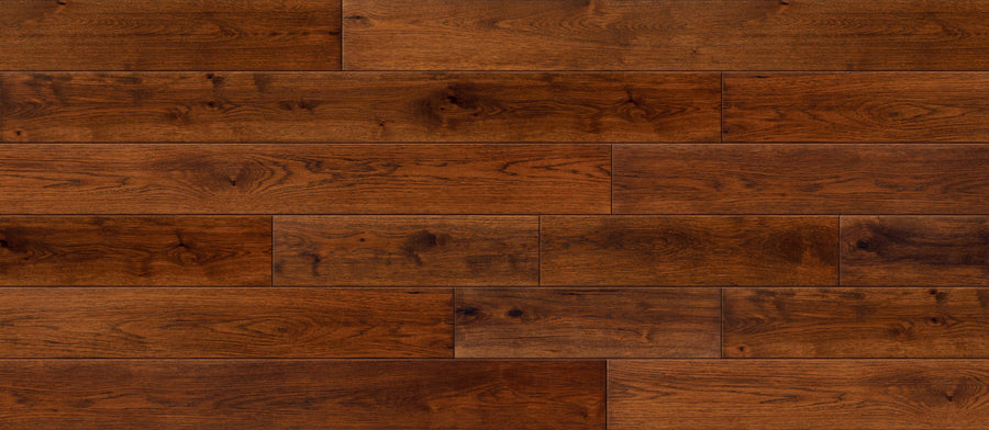Entourage 7 1/2" Hickory Hardwood features dark brown planks with visible grain and knots in a staggered layout. The smooth, polished finish highlights rich, warm tones and natural textures—perfect for high-traffic areas.
