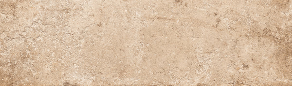 Empire 2x10 Brick Porcelain Tile features a textured beige surface with subtle color variations and roughness, offering the weathered stone look of aged parchment or rustic tile.