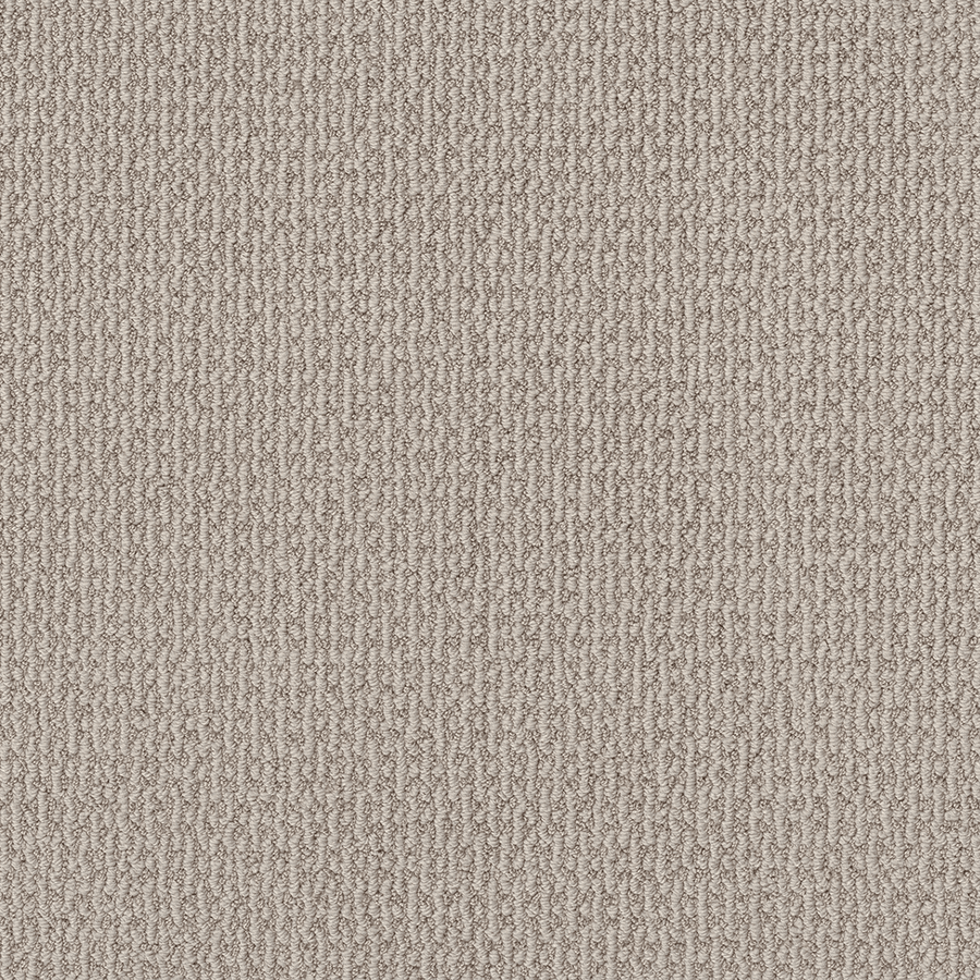 Close-up of Crafted Embrace Family Friendly Carpet in light beige. Its tight, textured loop pattern and high-performance fiber create a soft, uniform surface with subtle color variations for a simple, neutral background.