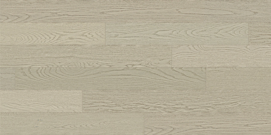 Dartmouth White Oak 6 1/2" Hardwood features light gray engineered floorboards with a subtle grain and wire brushed finish, arranged in a staggered pattern for a modern, clean look.
