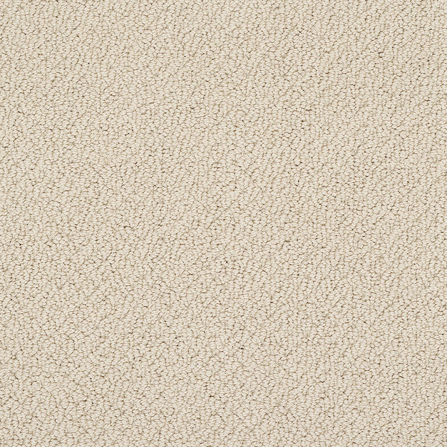 Close-up view of Smart Thinking Berber Carpet, featuring a cream-colored, textured loop with a subtle diagonal pattern. Its soft, tightly woven fibers provide a uniform look that adds elegance to any contemporary space.