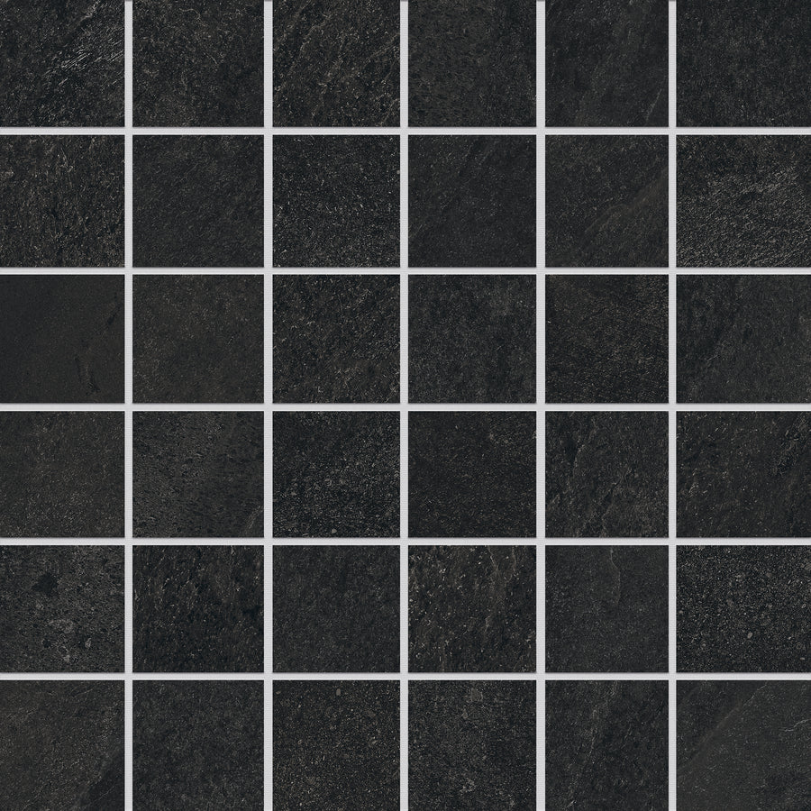 A grid of Shyft 2x2 Mosaic Porcelain Tiles, dark squares with subtle texture and shade variations, separated by thin white grout lines. The evenly arranged tiles create a uniform, geometric pattern.
