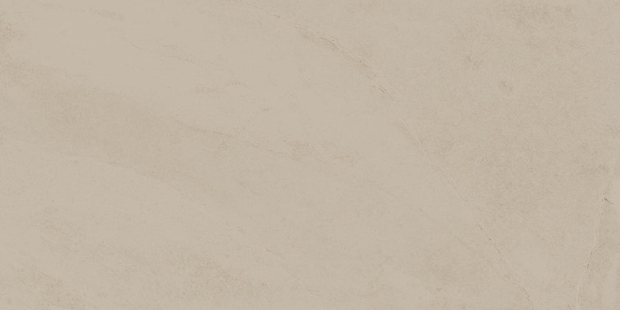 Shyft 24x48 Rectified Porcelain Tile features a light beige, textured surface with natural-looking lines, resembling Brazilian slate or marble. Its smooth, neutral design is ideal for minimalist spaces and versatile backgrounds.