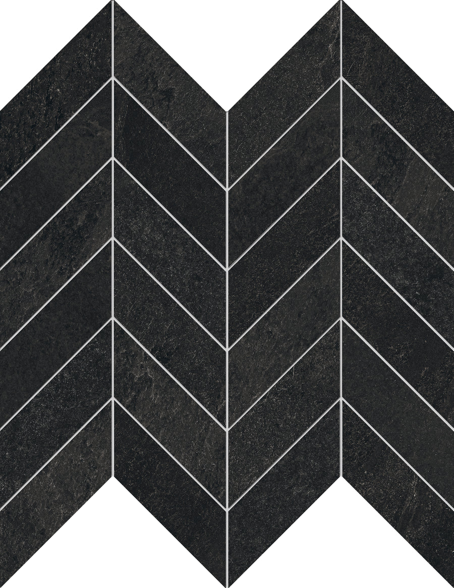 Shyft Chevron Mosaic Porcelain Tile features a chevron pattern of dark rectangular tiles in black and dark gray with thin white grout lines. The textured, stone-like porcelain creates a luxurious, V-shaped zigzag design.