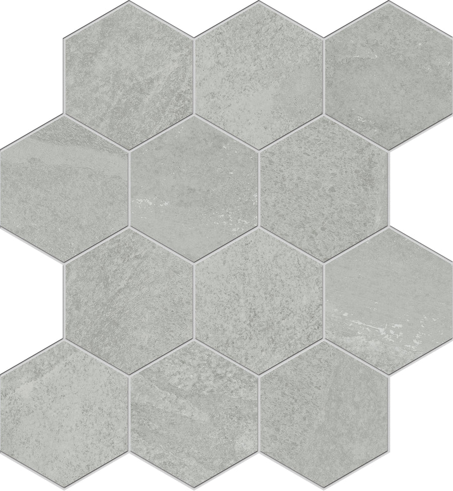 The Shyft Hexagon Mosaic Porcelain Tile features a light gray honeycomb pattern, with each tile showcasing subtle texture and shading variations for a modern look.