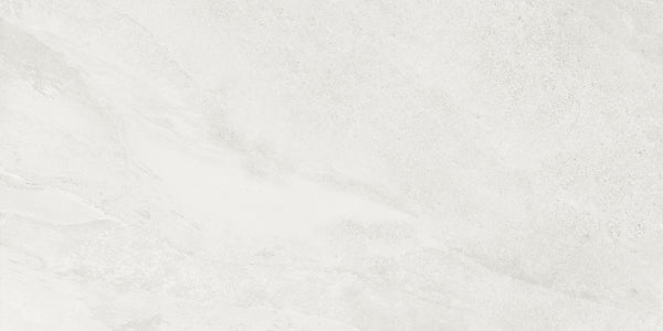 The Shyft 24x48 Rectified Porcelain Tile features a light gray, marble-like texture with subtle veining—perfect for achieving the refined appearance of Brazilian slate in a durable, large-format tile.
