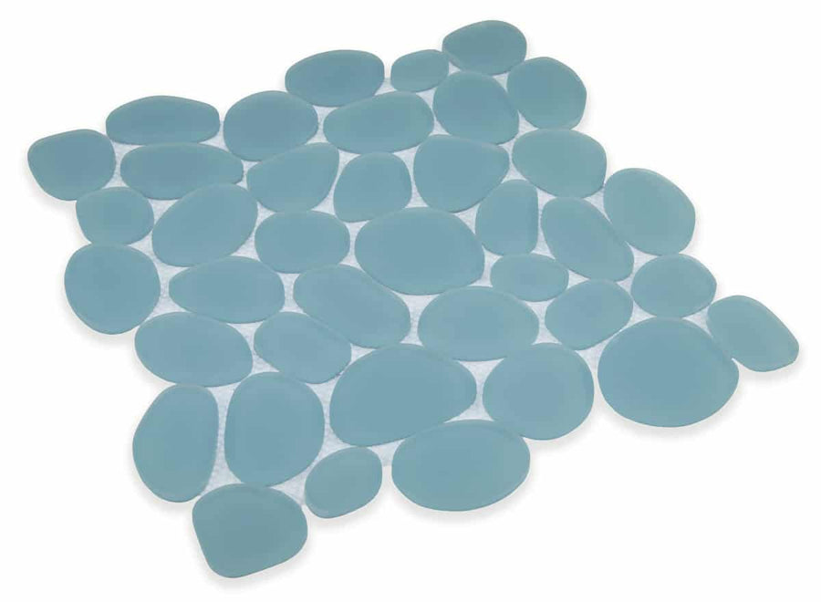 The Spindrift Matte Pebble Glass is a square mat featuring overlapping, smooth blue pebble-shaped pieces that resemble river stones. Its soft, textured surface makes it ideal for use as a bath or shower mat.