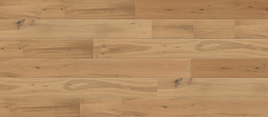 Ellington European Oak 8 5/8" Hardwood features light brown tones with visible natural grain and occasional knots. Its staggered wide planks, smooth finish, and subtle color variations create a clean, elegant look.