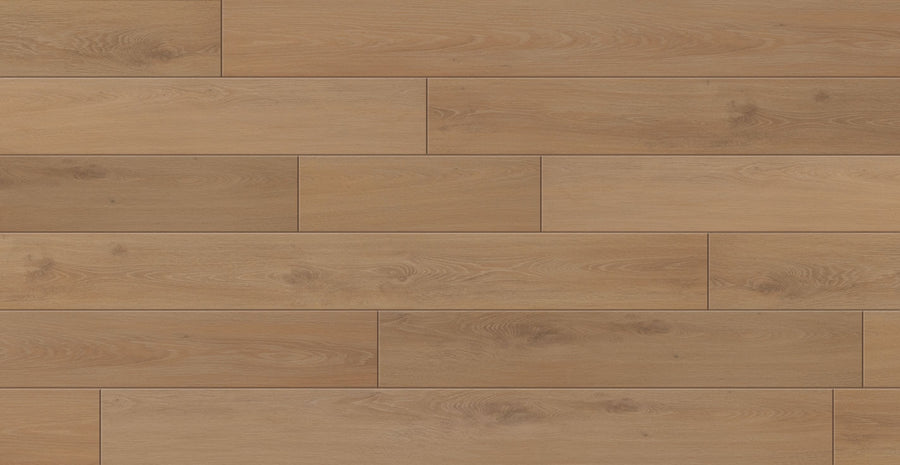 Artistry 7 5/8" Waterproof Laminate features a light brown hardwood texture with natural grain, subtle knots, tone variations, and staggered rectangular planks for a warm look. It boasts an AC5 rating for outstanding durability.