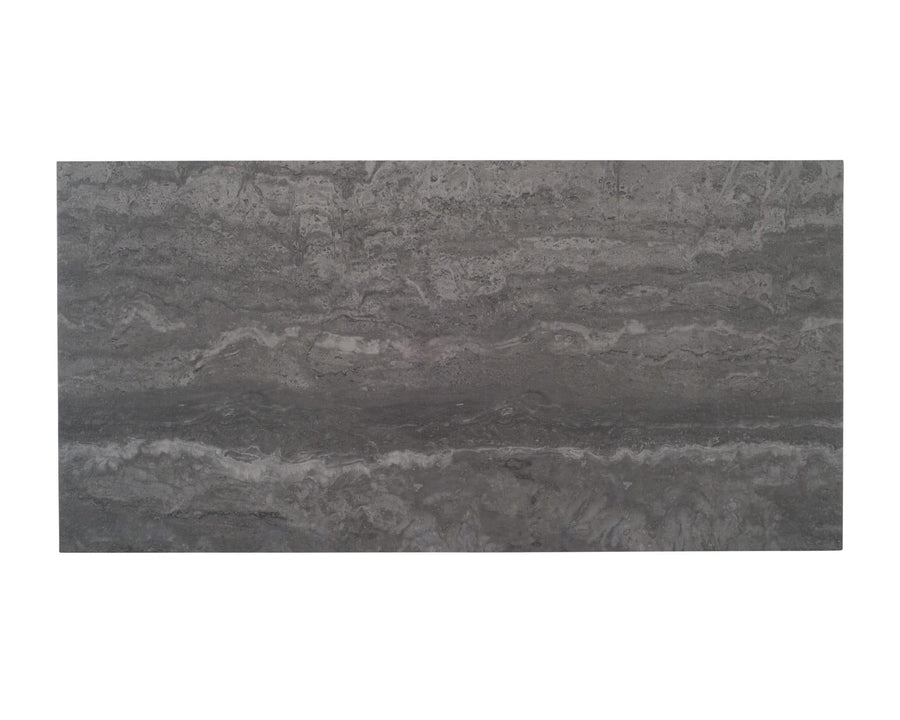 The Tivoli 12x24 Porcelain Tile features layered, wavy patterns in gray with subtle white streaks, offering a refined travertine look. Perfect for modern spaces and provides the easy care of porcelain tile.