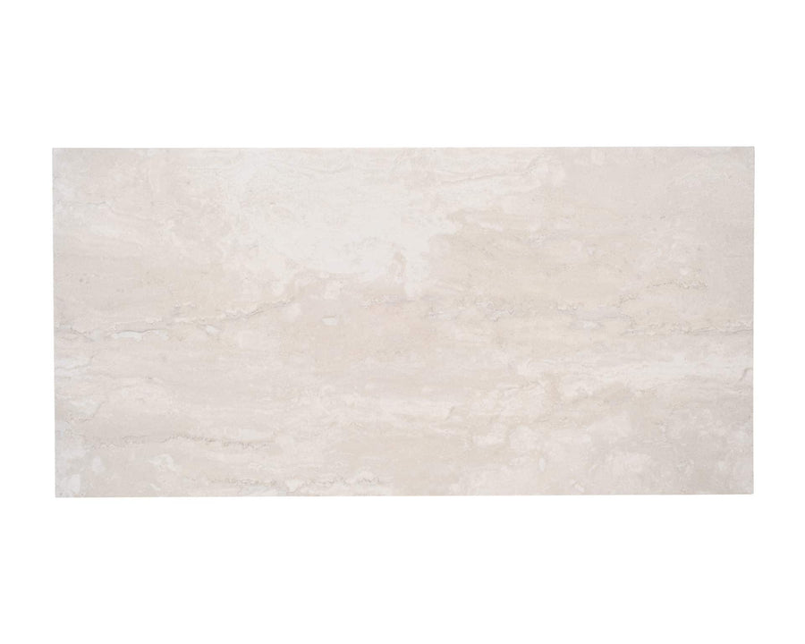 The Tivoli 12x24 Porcelain Tile features a rectangular, rectified shape and a light beige, marble-like pattern with subtle veins, offering the look of natural travertine stone against a plain white background.