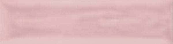 The Watercolor 3x12 Subway Tile is a rectangular, glossy tile in soft pastel pink with subtle shading and a smooth, slightly uneven texture—ideal for modern designs or adding fresh color to your space.
