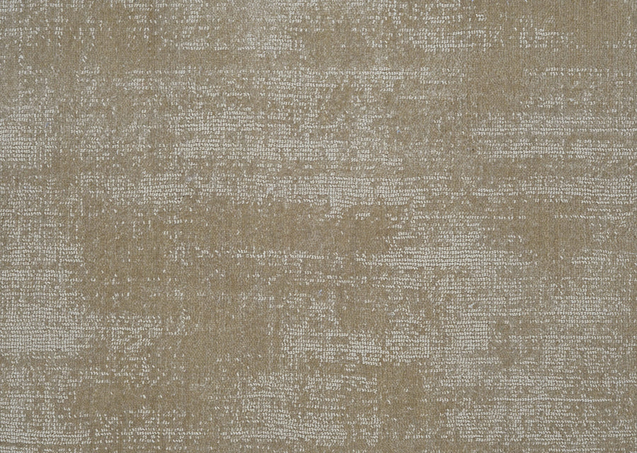 A close-up of the Prague On Trend Carpet reveals a luxurious beige and light brown fabric-like texture with irregular white distressed patterns, highlighting its modern color palette.