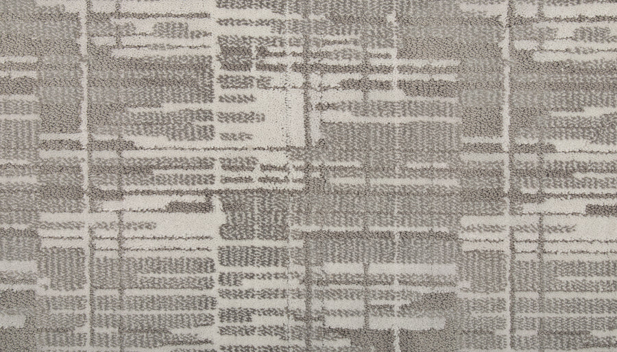 The Tartan Veil On Trend Carpet features a gray and white abstract geometric pattern with horizontal and vertical lines and rectangles, offering a modern, textured style—ideal for those seeking elegant flooring.