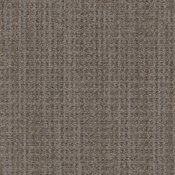 Close-up view of Winslow Berber Carpet featuring a multi-dimensional loop pattern. Tightly woven fibers create subtle striped effects in varying shades of brown and beige, evoking natural woven textures.