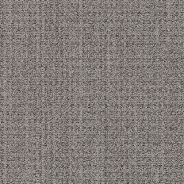 Close-up of Winslow Berber Carpet featuring a gray, woven texture and tight, multi-dimensional loop pattern. The durable and uniform material is ideal for upholstery or carpeting.