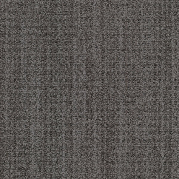 Close-up of the Winslow Berber Carpet, showing a textured gray surface with multi-dimensional loops, subtle shading variations, and vertical lines that resemble natural woven patterns.