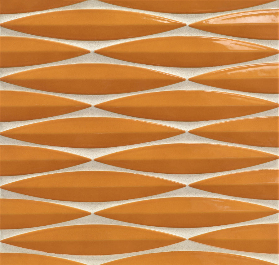 Close-up of Ka-Nu Keel 3D Mosaic Tile featuring glossy orange elongated diamonds arranged in horizontal rows on a light beige background. The three-dimensional design creates a visually dynamic, geometric pattern.