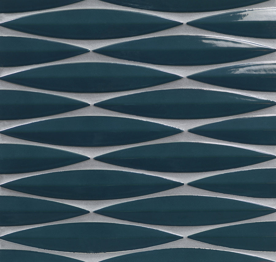 Close-up of a wall featuring Ka-Nu Keel 3D Mosaic Tile: dark teal, elongated ceramic tiles arranged horizontally with thin light gray grout lines and distinctive glaze colors.